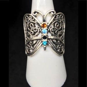Silver Butterfly With Gemstones Going Down The Spine Of The Ring